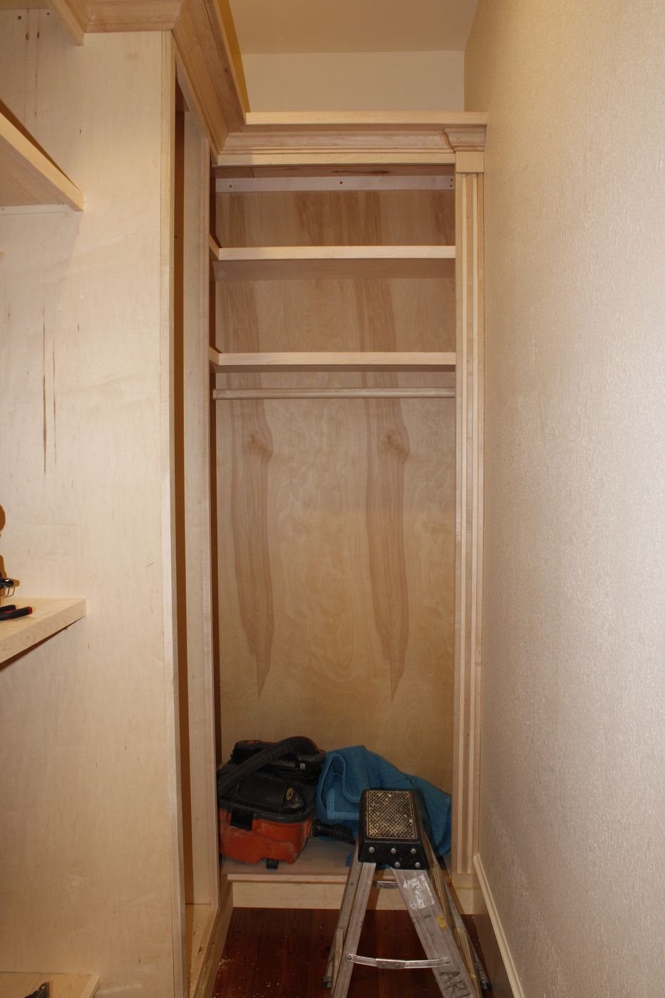Custom closet shelving under construction