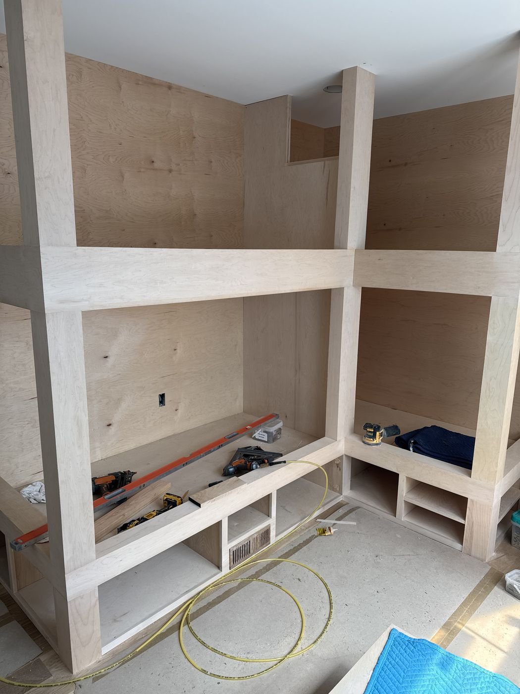Custom built-in bunk bed framing under construction