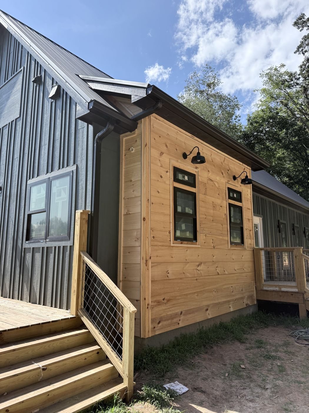 Cedar plank siding and covered entry on a home exterior