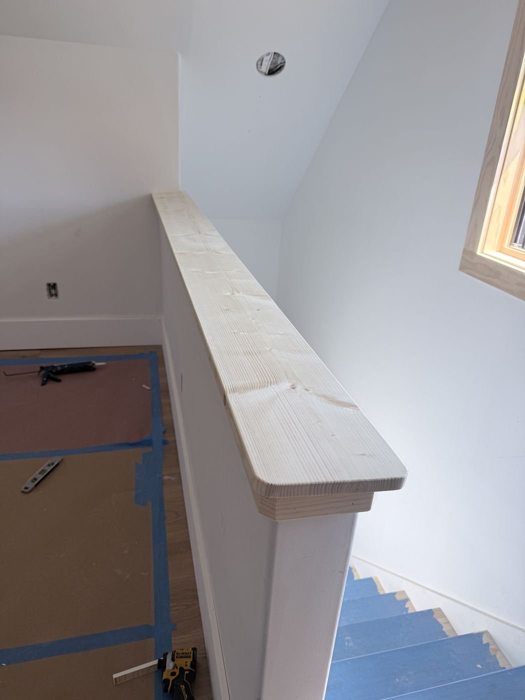 Wood stair handrail installation detail