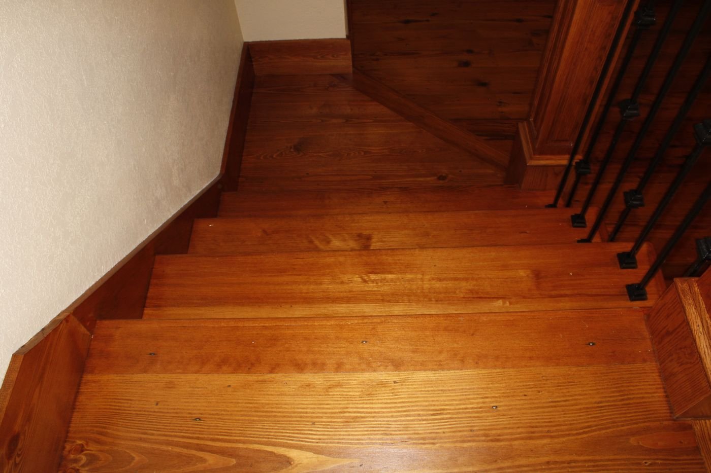 Hardwood staircase view from the top landing
